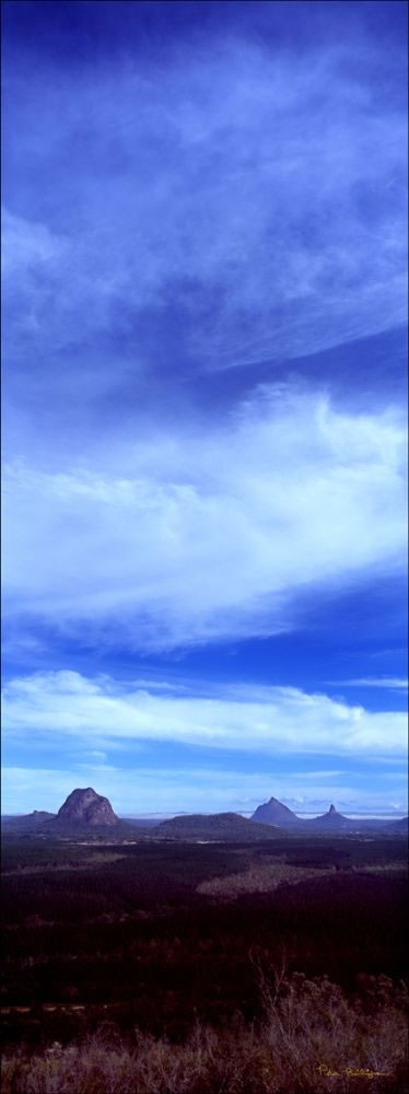 Glasshouse Mountains with Cyrus Clouds Vertical